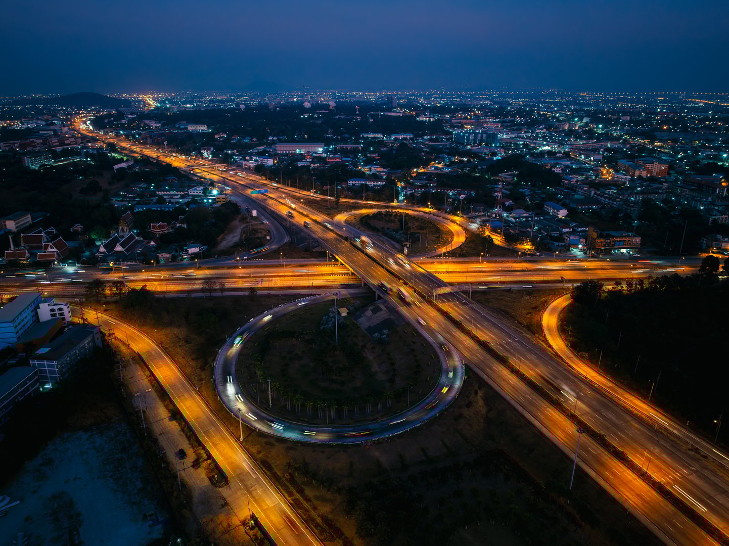 aerial view at twiligh scene, ring road and cityscape with blue sky background,
