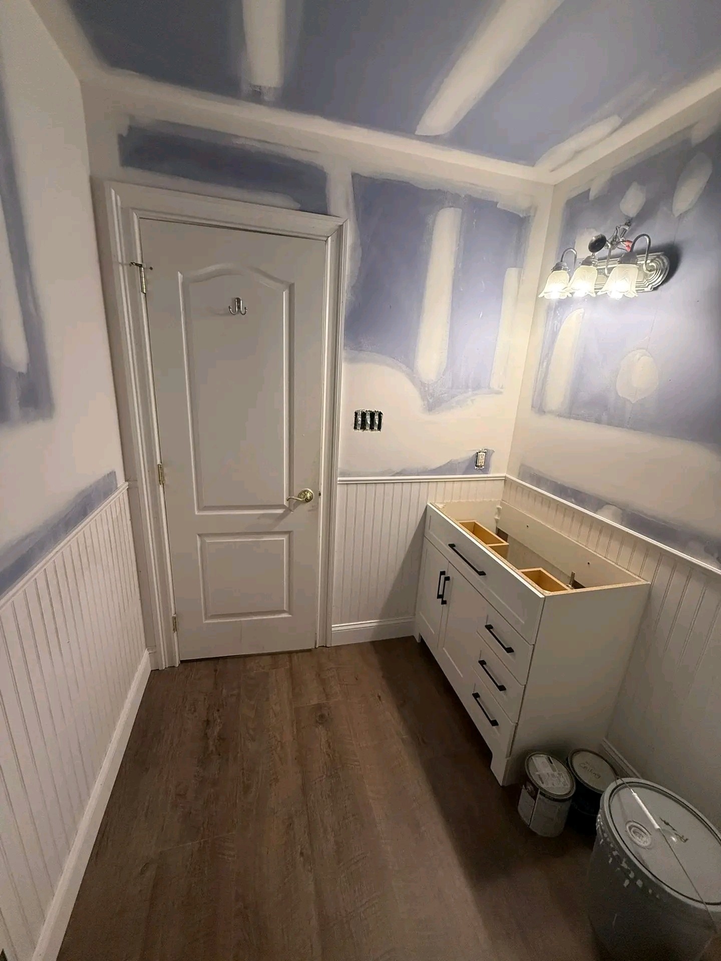 Bathroom drywall installation with moisture-resistant materials