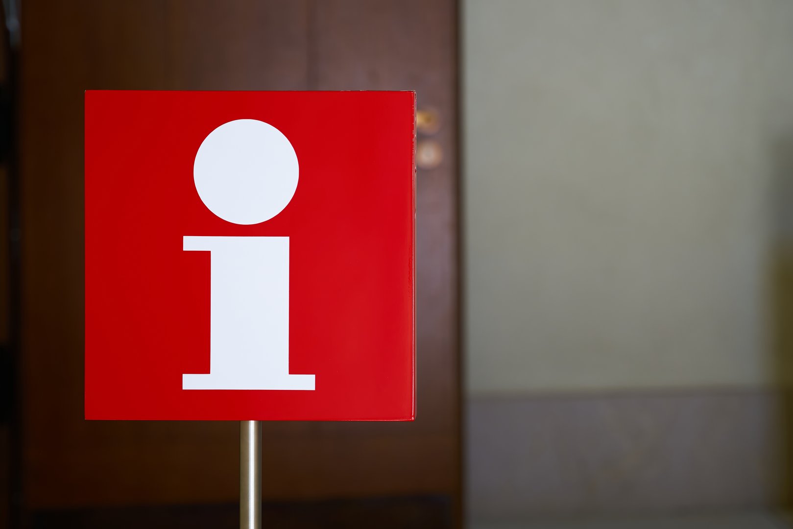 Sign indicating a tourist information center for tourists from all over the world in the Humboldt Forum in Berlin