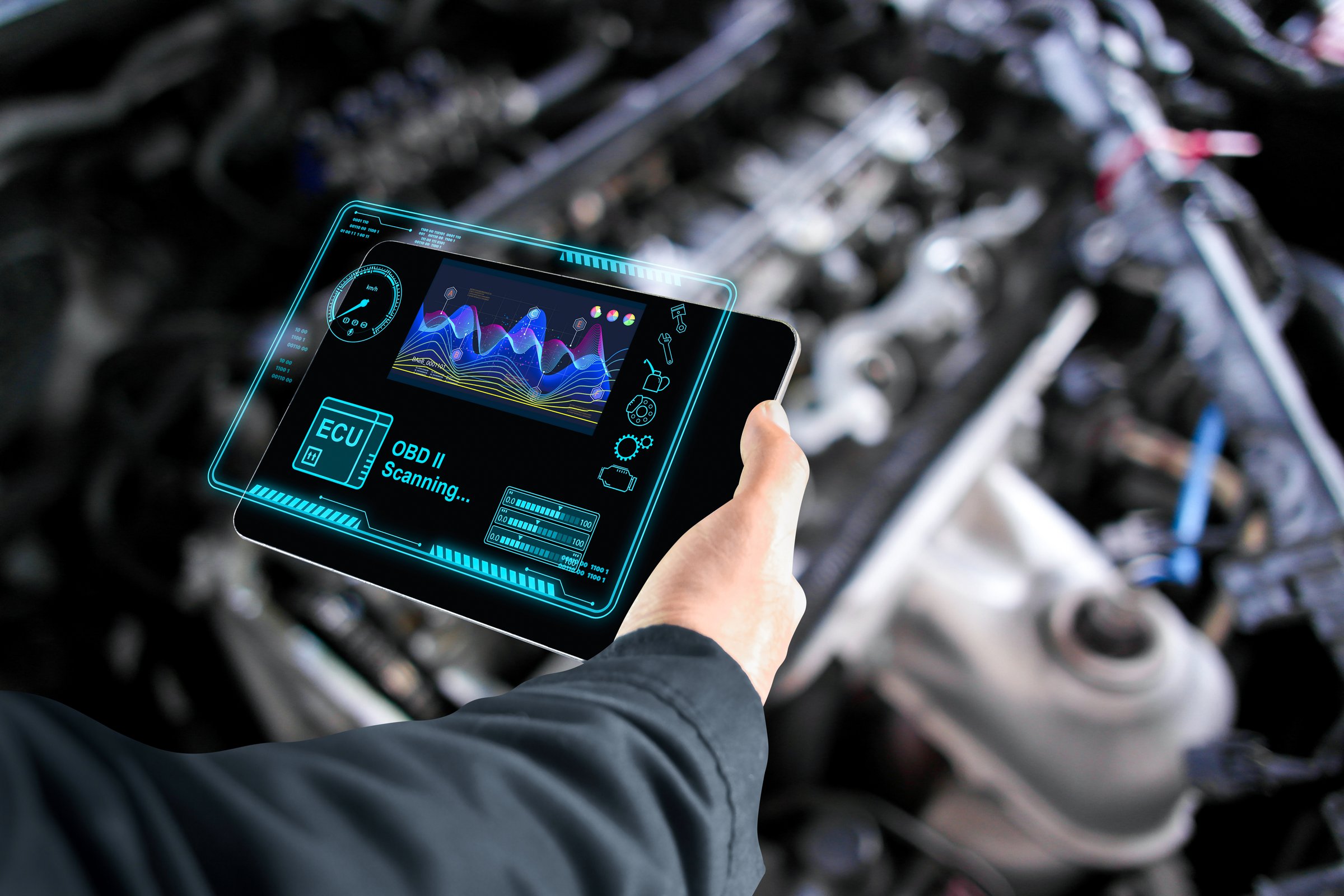 Car mechanic checking ECU electronic control unit with OBD or OBD2 wireless scanner tool , car information showing on screen interface , Car maintenance service concept