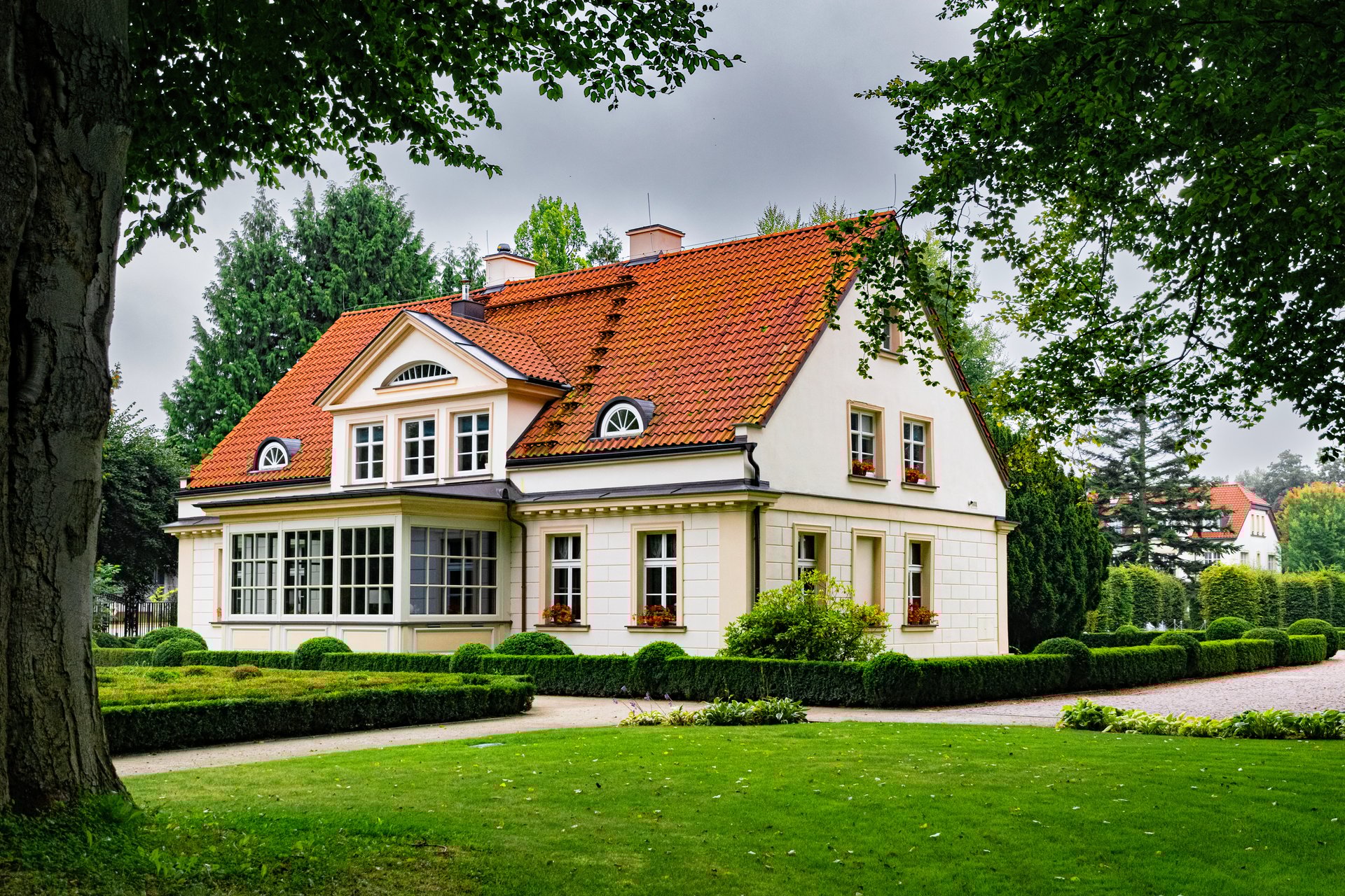 Gdansk, Poland - September 14, 2025: beautiful tradition wealthy suburban house among green summer garden