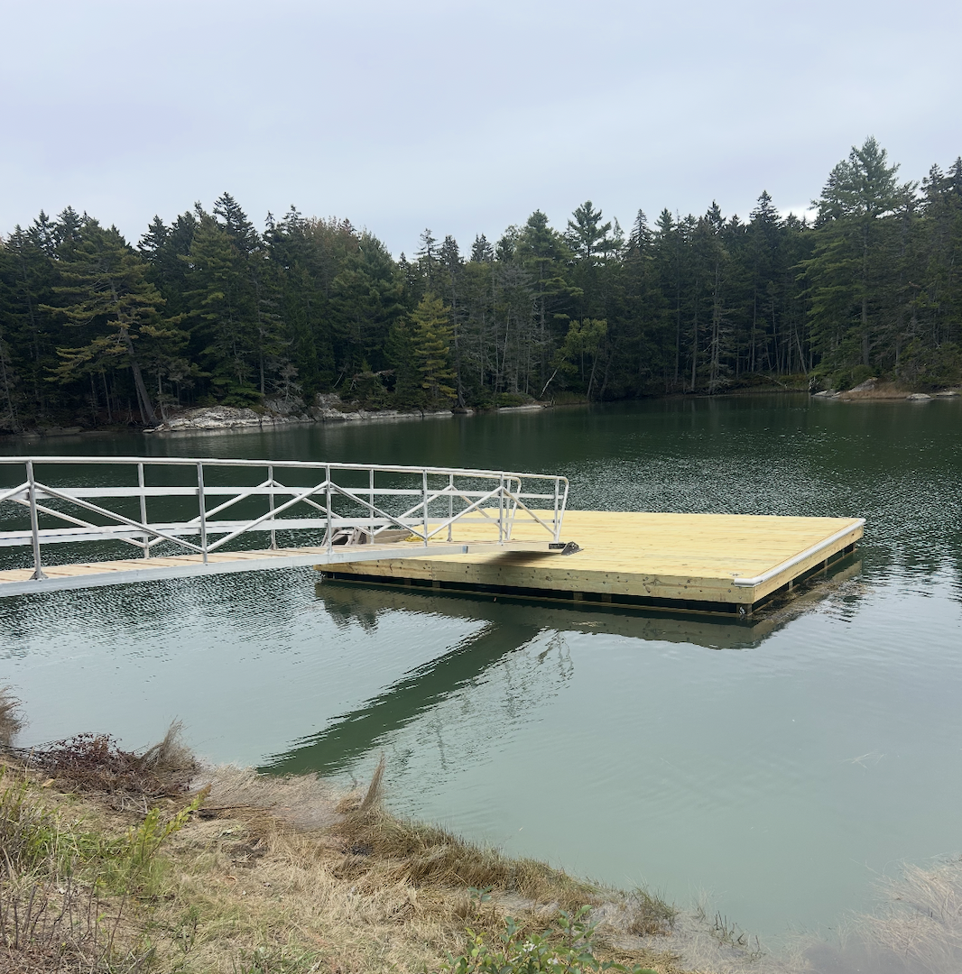 Marine float installation by Midcoast Dock LLC