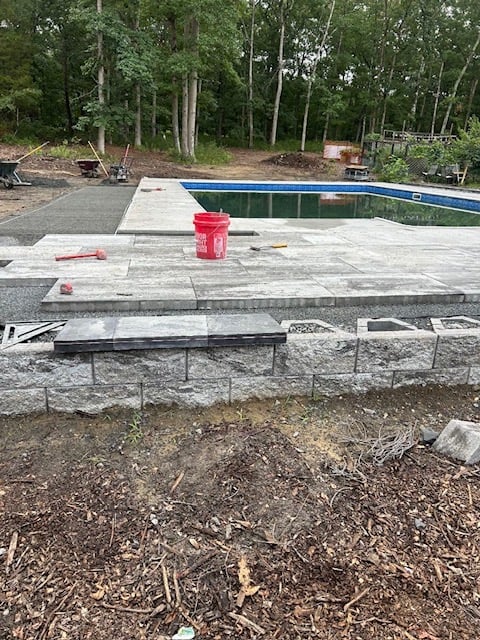 Pool paver installation in progress