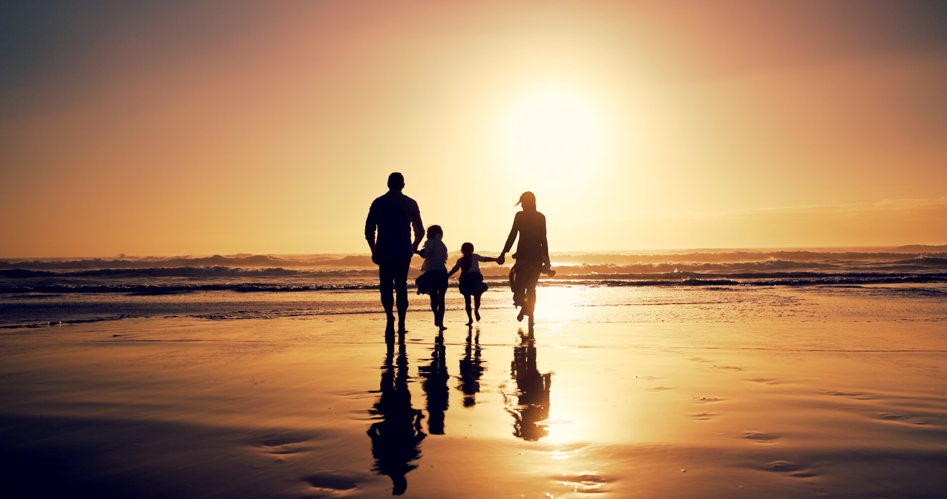 Sunset, family and holding hands at ocean for vacation, walking and bonding together outdoor. Back, mother and father with children at beach with mockup space, travel or summer adventure with parents
