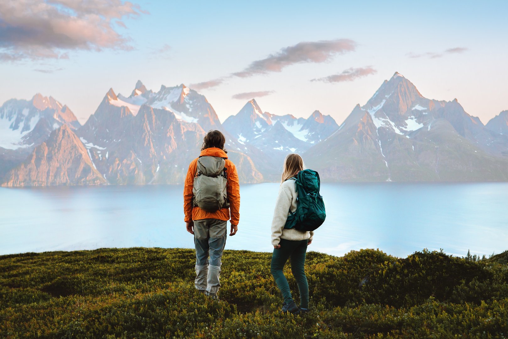 Couple enjoying mountains landscape outdoor travel