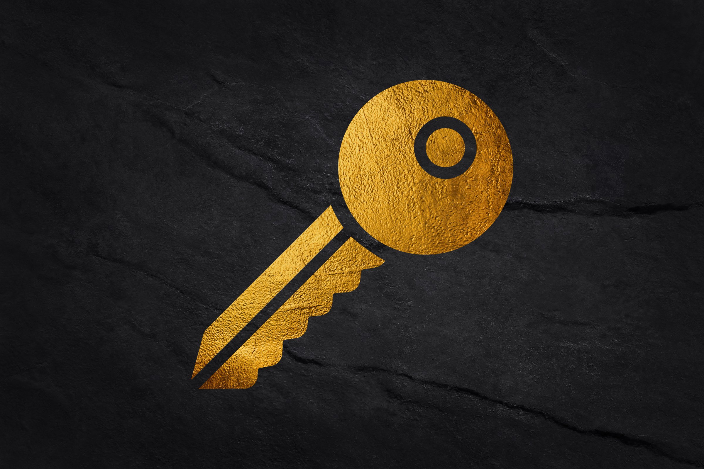 Golden sign. Gold maps or symbols. Isolated textured golden logo on dark background.