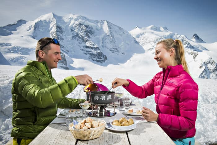 Traditional Swiss cheese fondue, authentic Swiss cuisine
