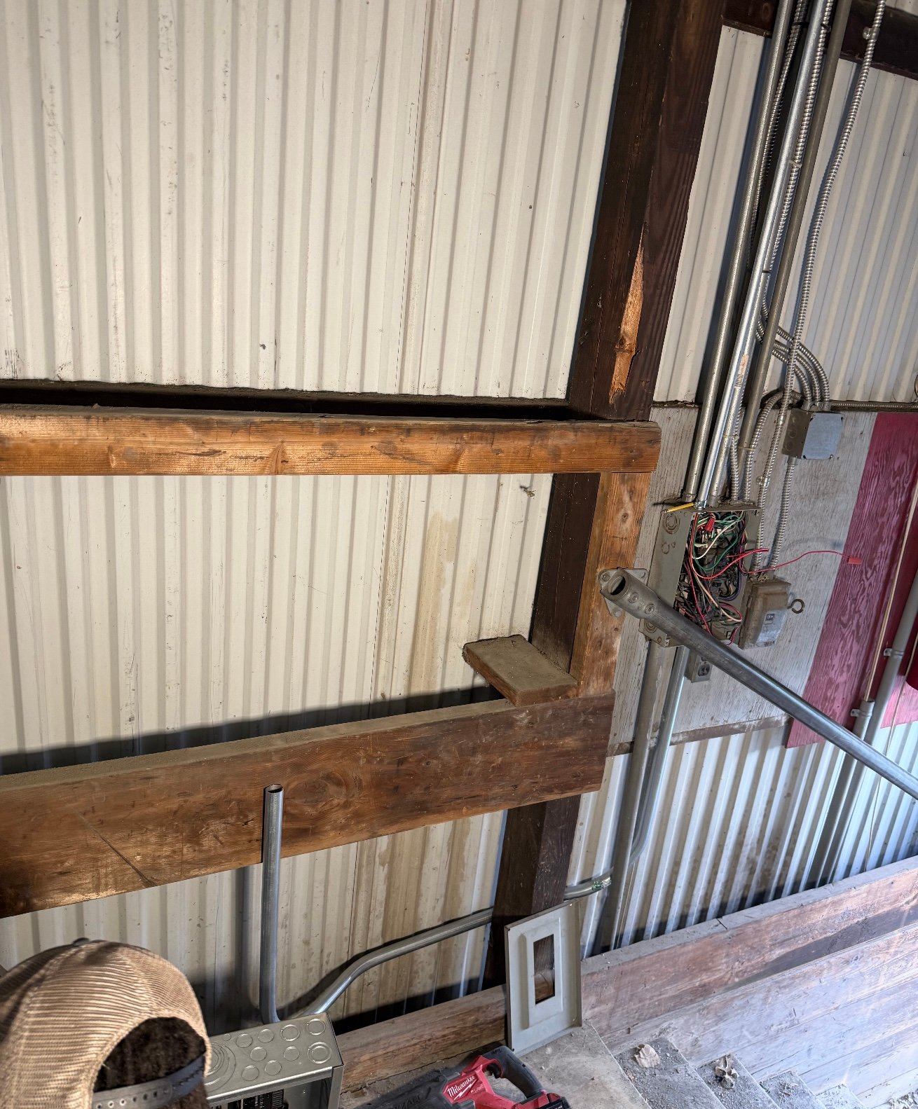 Old warehouse breaker panel before upgrade