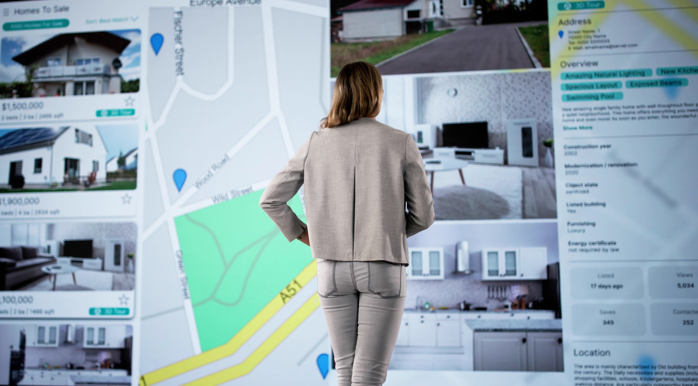 Virtual House Hunt: Young Woman Searches Online Real Estate Listings