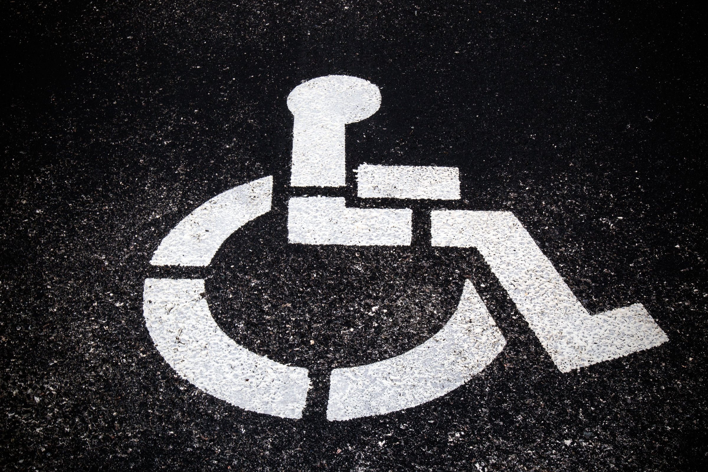 Handicap parking space with proper blue striping