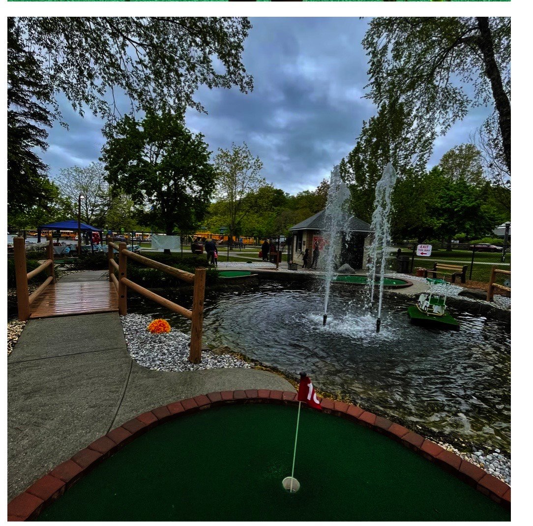 Creative mini golf hole design with artistic obstacles and landscaping features