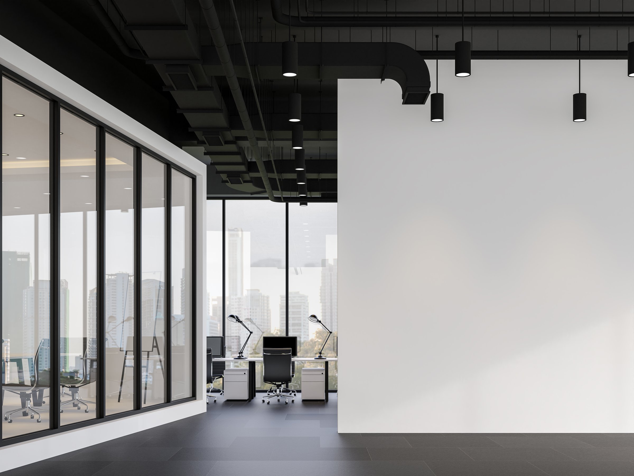 Minimal style office with empty white wall 3d render.There are black granite tile floors and black ceilings with piping systems. with large windows, overlooking city view.