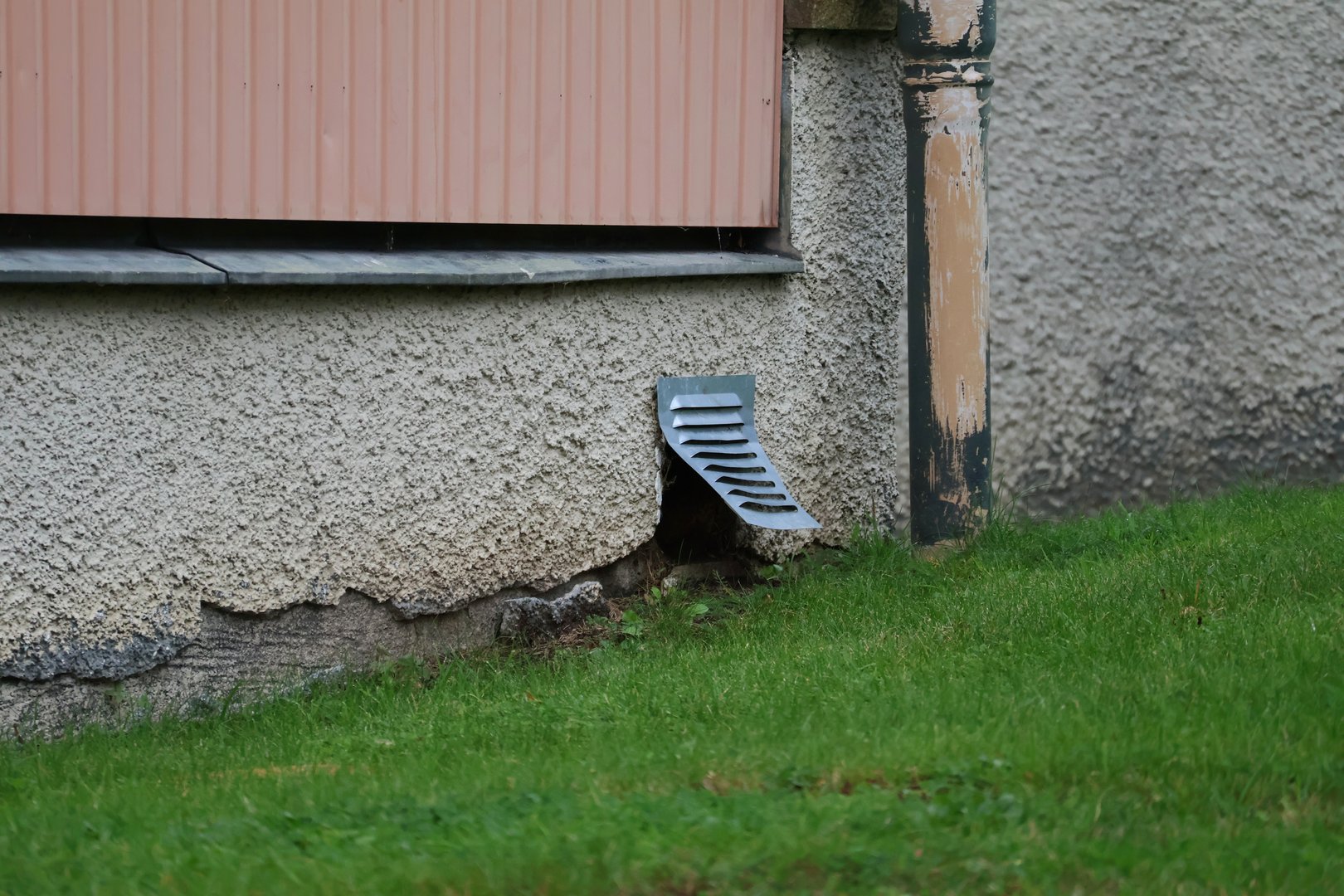 Broken metal air vent