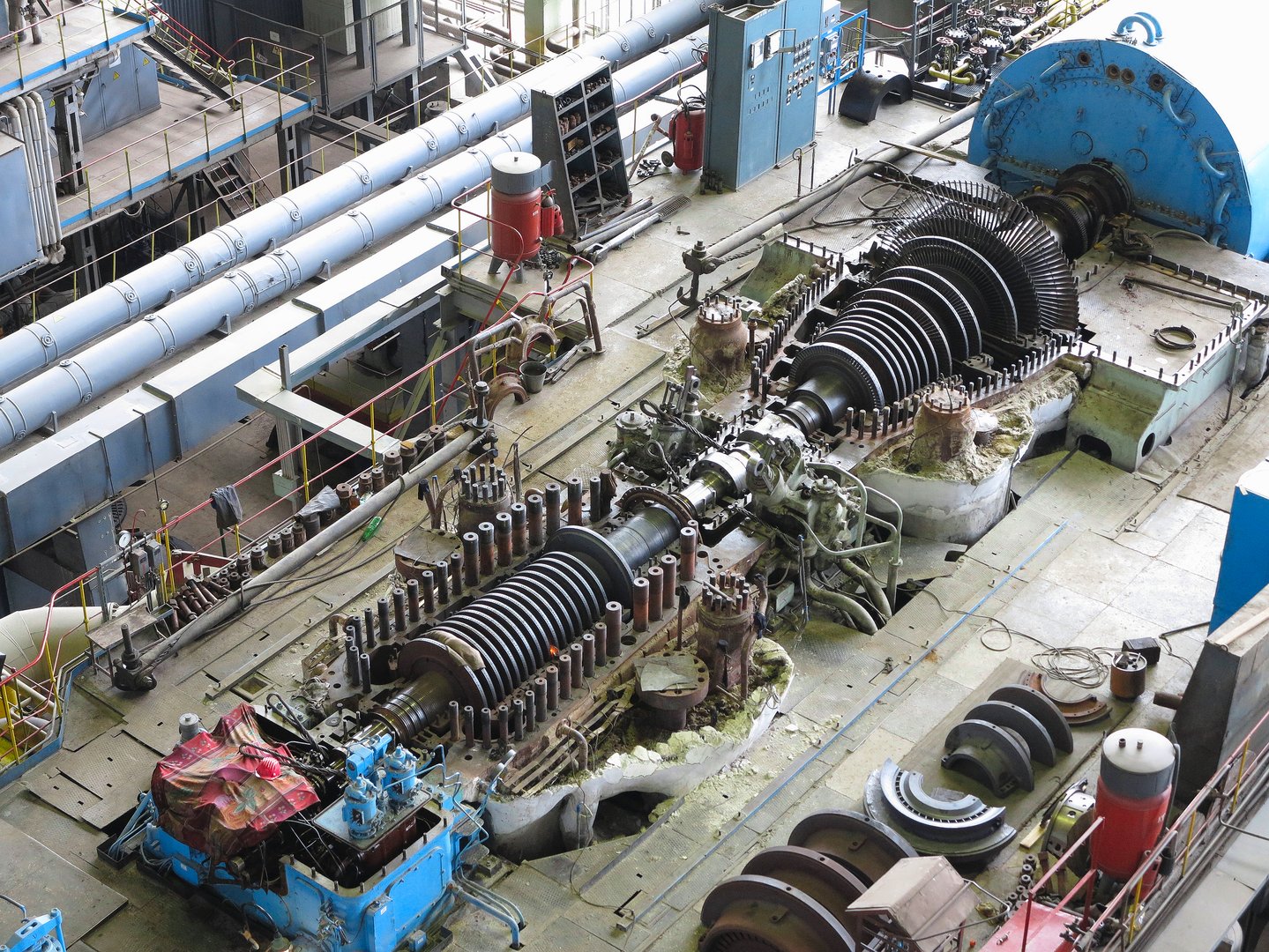 steam turbine in repair process, machinery, pipes, tubes, at an power plant