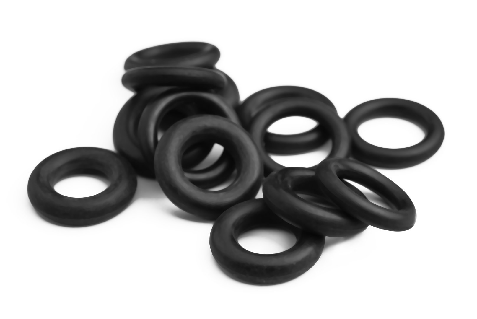 Black Rubber O-Rings for Industrial Sealing and Machinery Components on White Background