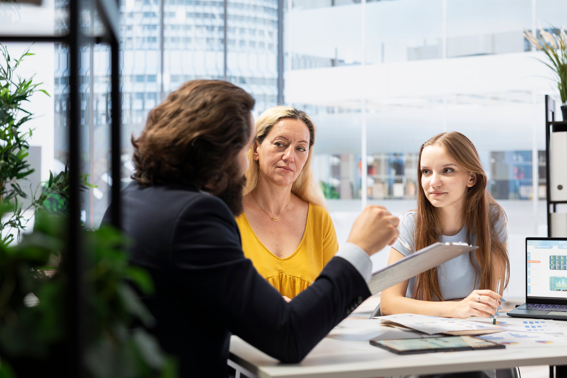 Latin American family with insurance advisor