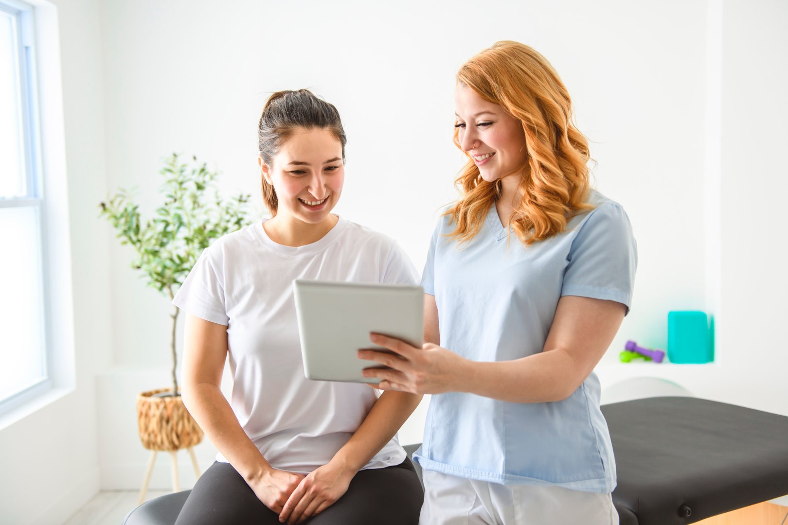 A Modern rehabilitation physiotherapy at work with client