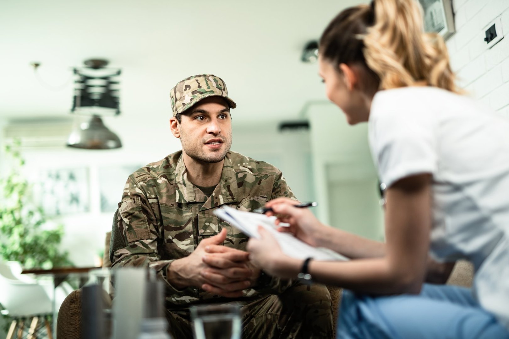 Woman consulting with Army recruiter
