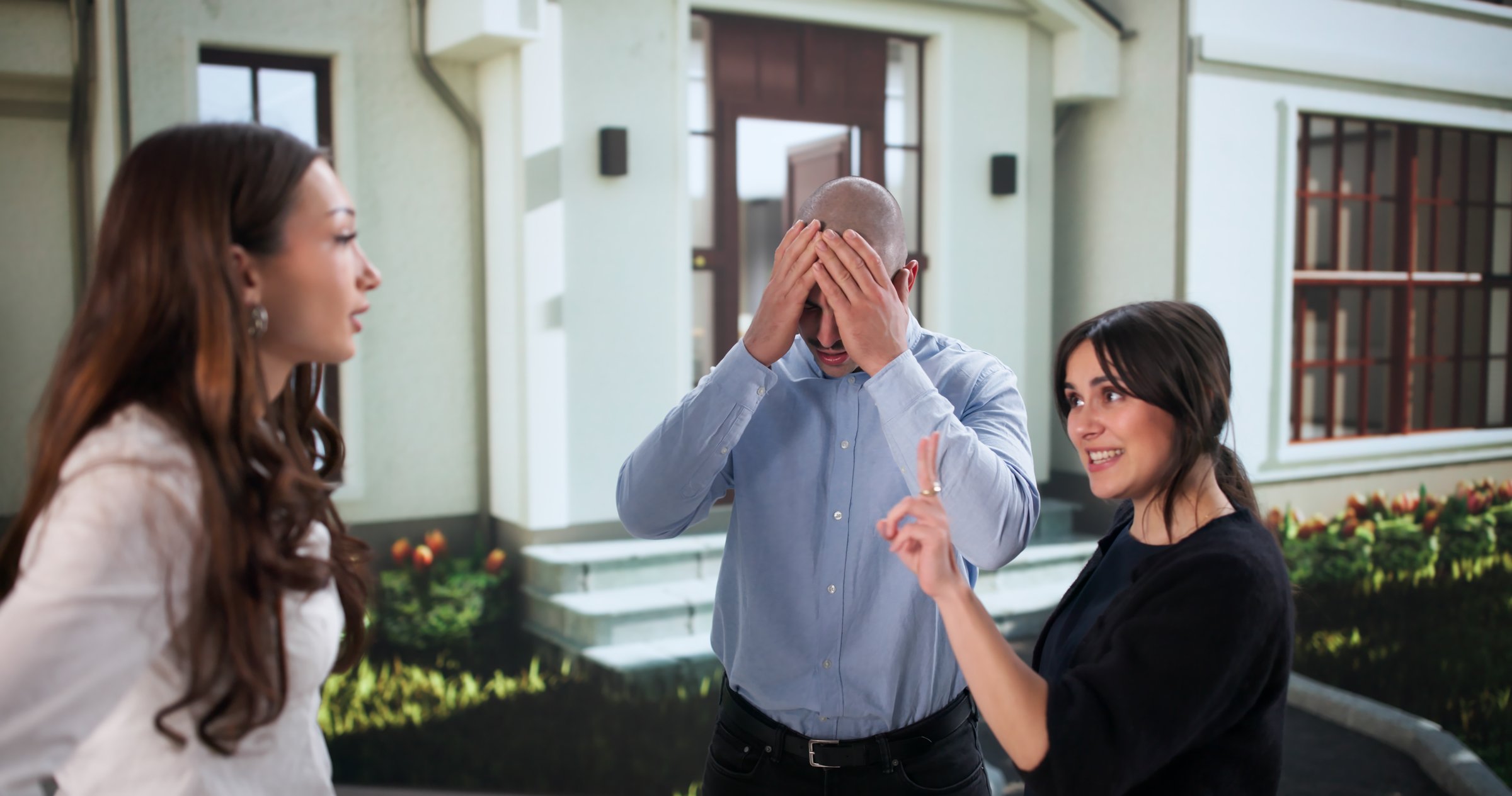 The Mediator: Young Couple Arguing Over Boundary Dispute With Neighbors.