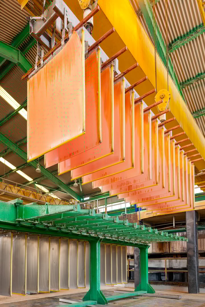 Close-up to copper cathodes in an electrowinning plant at a copper mine.