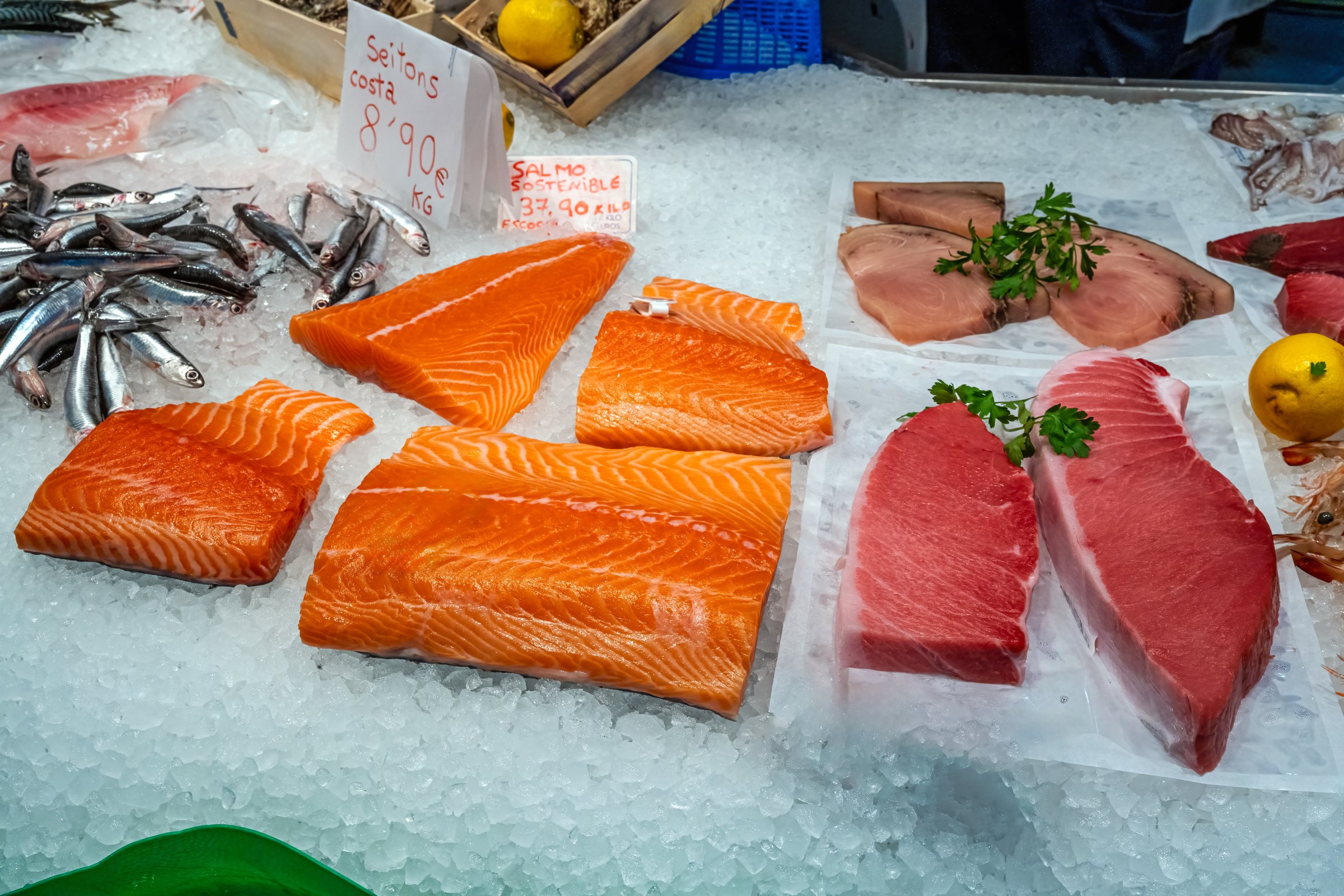 Salmon and other fish fillets for sale at a market in Barcelona, Spain