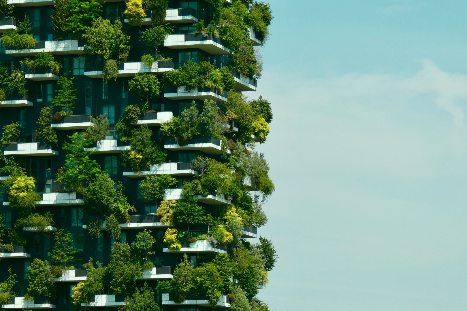 Skyscraper with trees on balconies