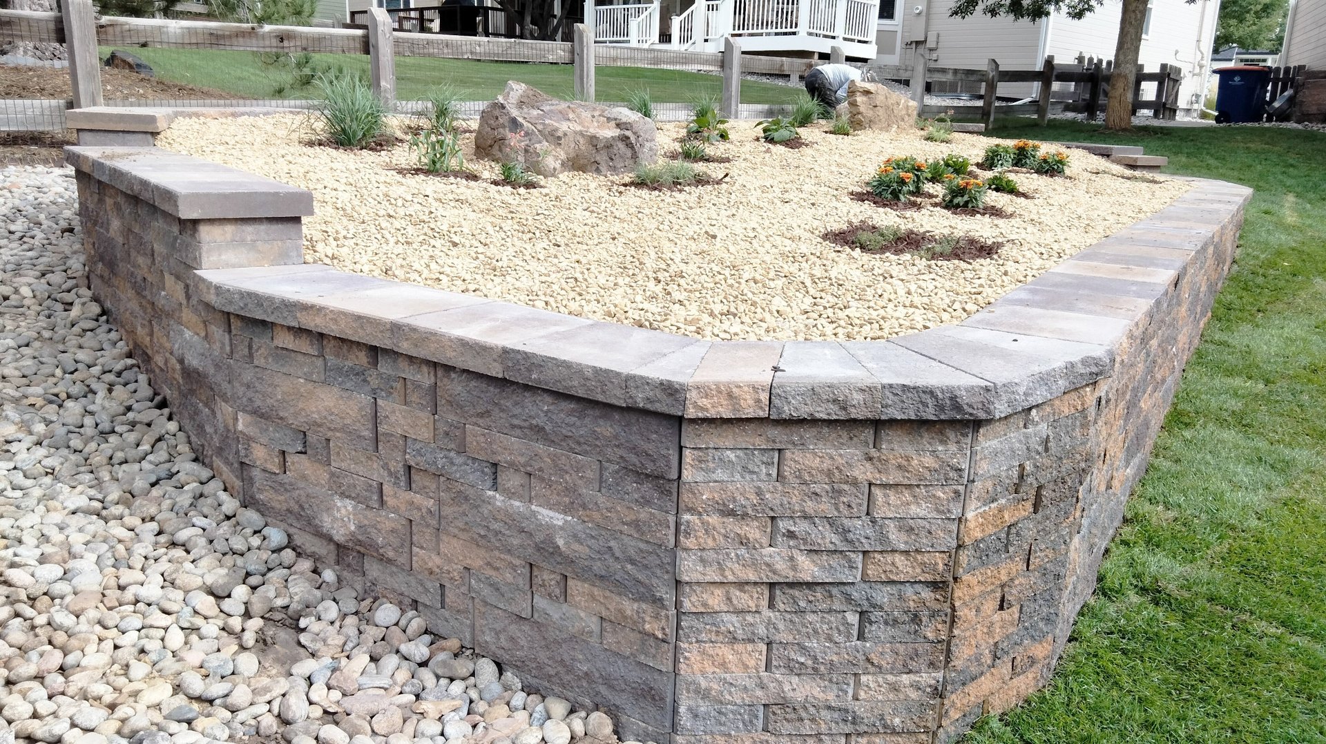 Garden bed with retention wall landscaping project