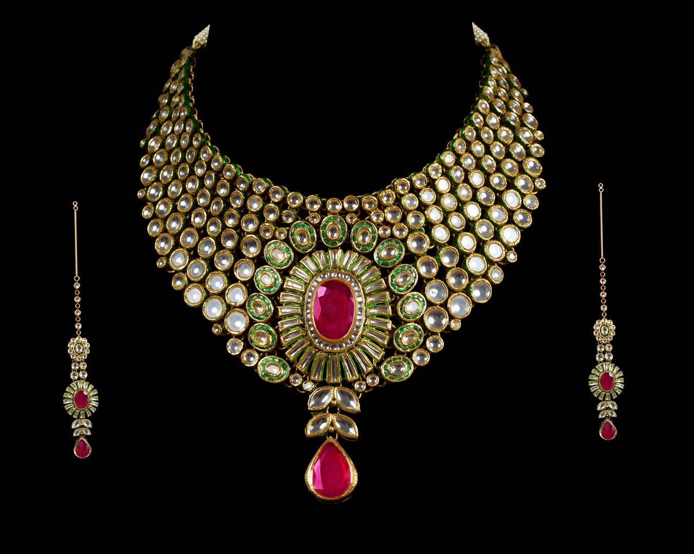 Close up of diamond necklace on black background with diamond ear ring