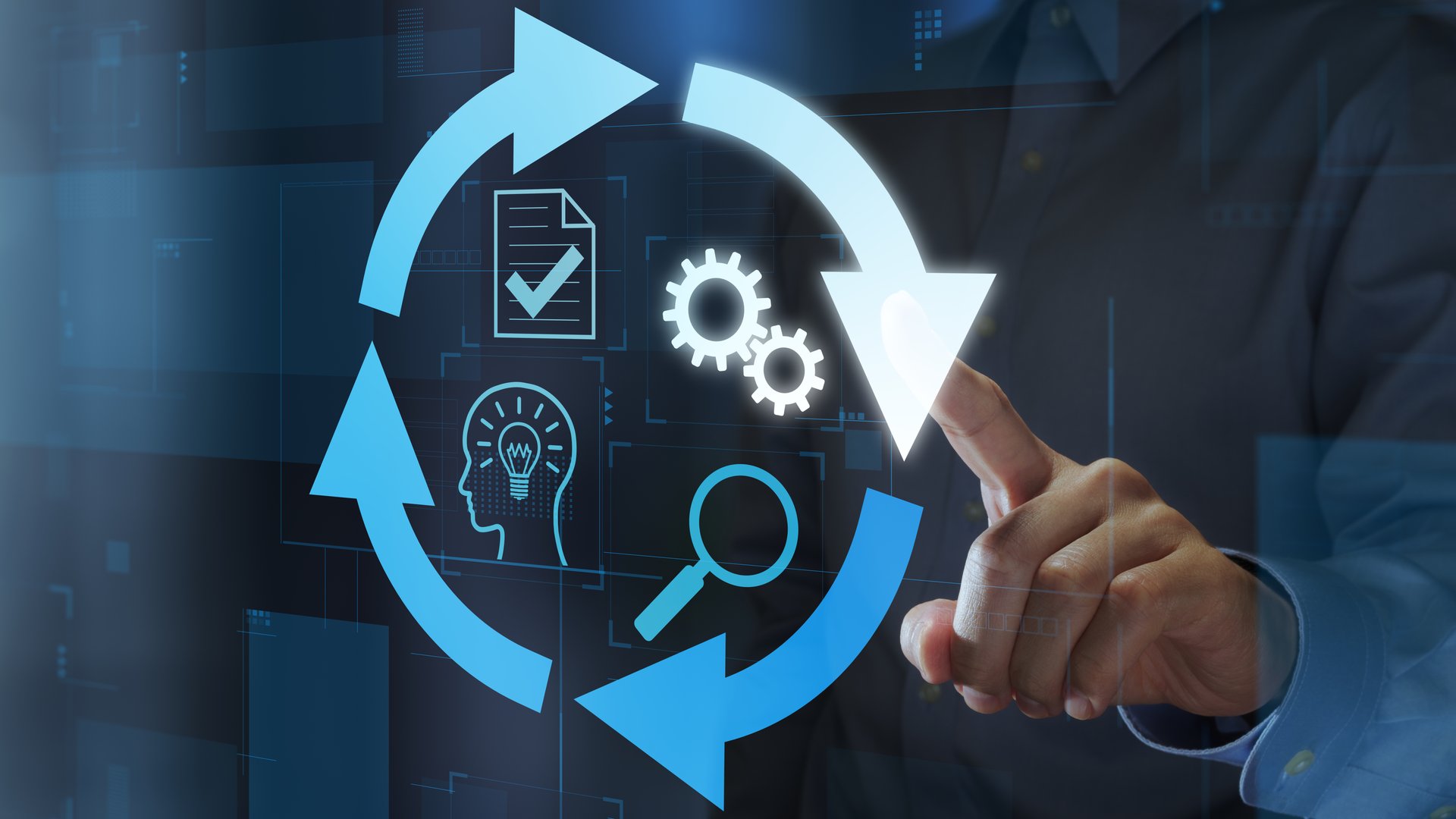 Engineer tapping arrow symbol.