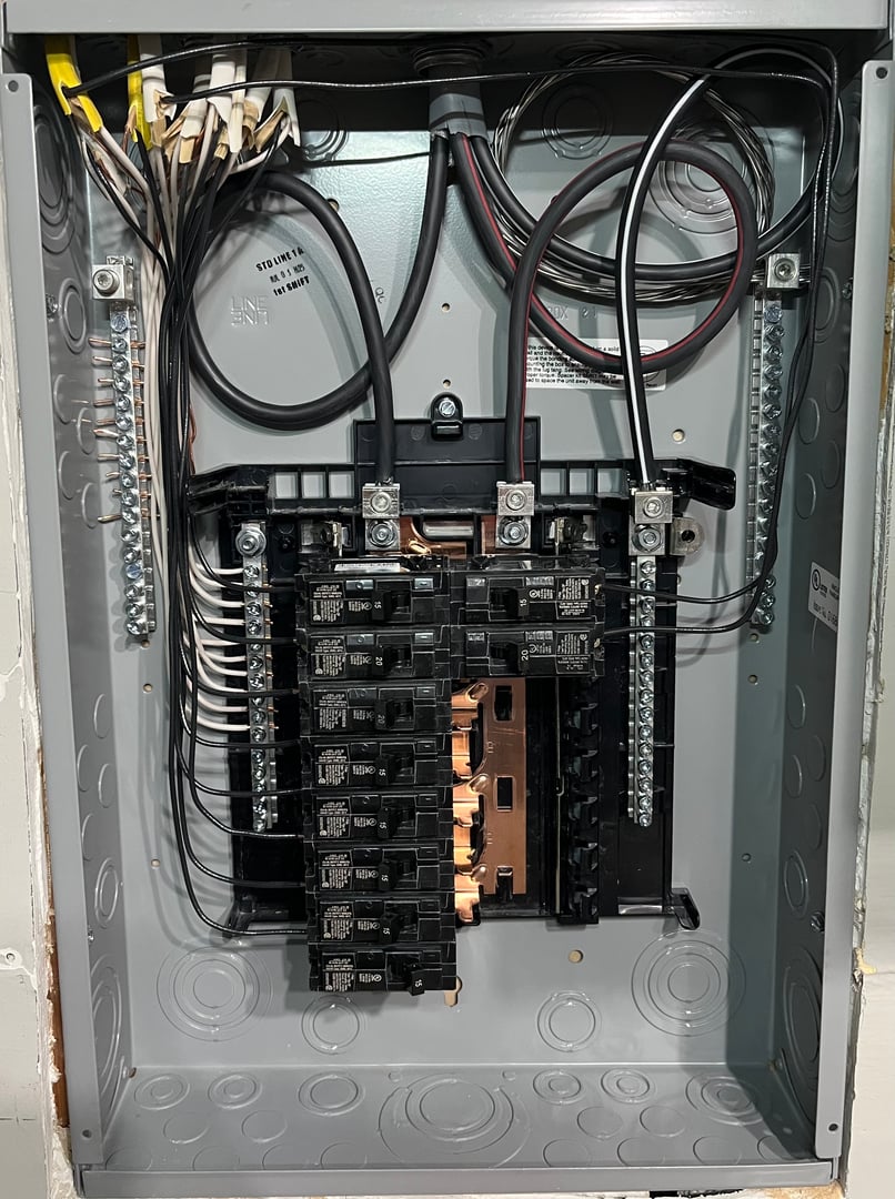 Residential electrical panel upgrade with circuit breakers and wiring