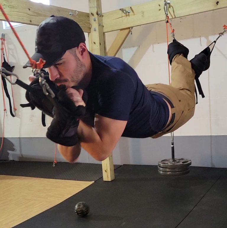 Man in tank top training