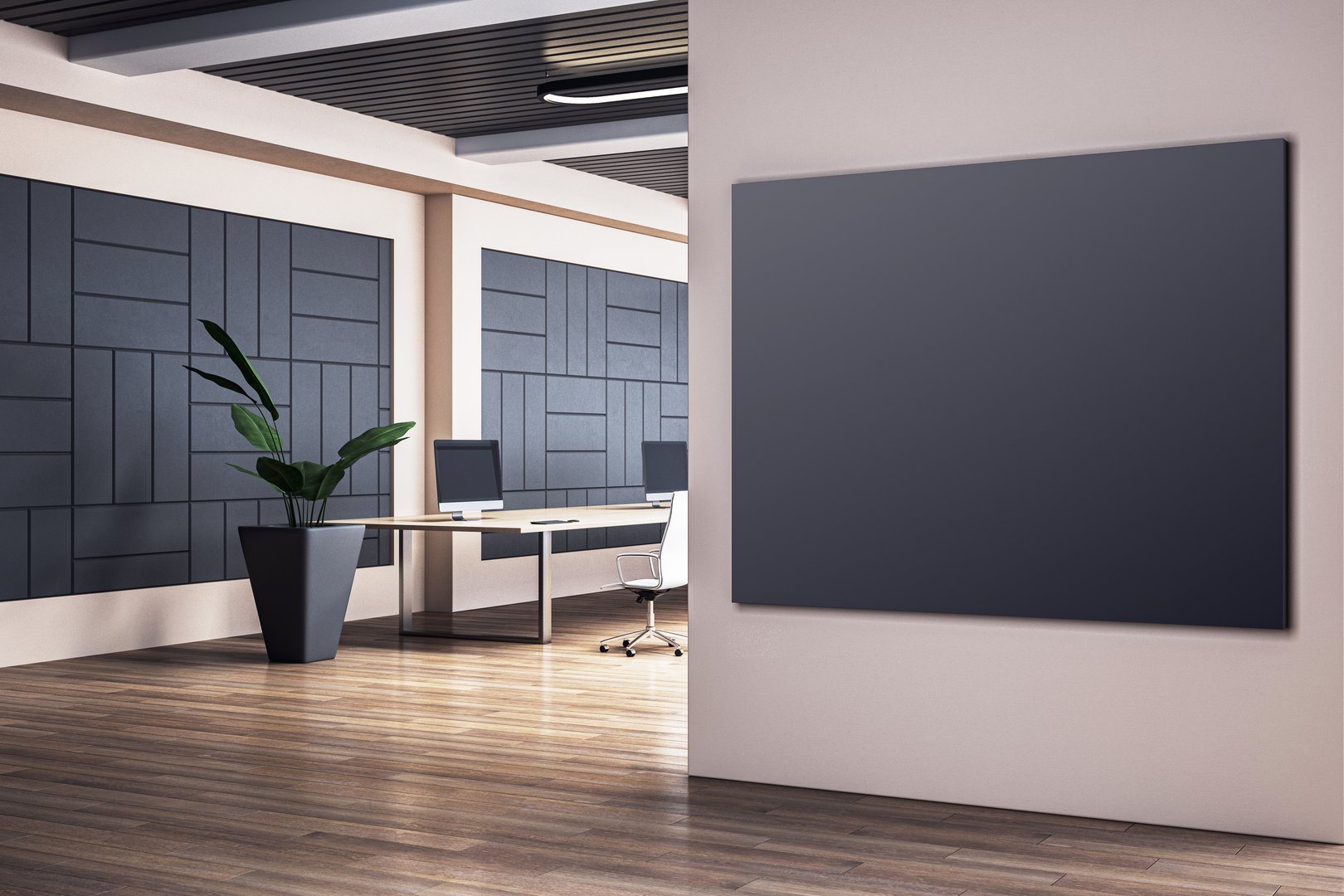 Modern office with blank black frame on wall, sleek desks, wooden flooring, and decorative plant in a pot. Bright and professional workspace. 3D Rendering.