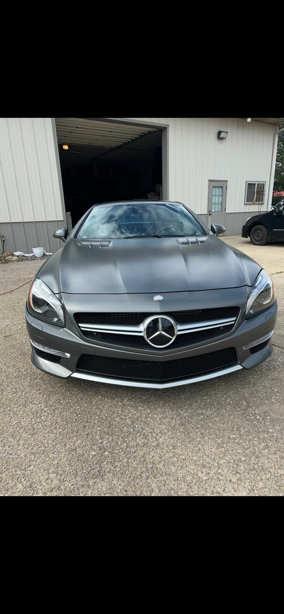 Professional car interior detailing showing pristine dashboard and console cleaning by Maxx's Mobile Detailing