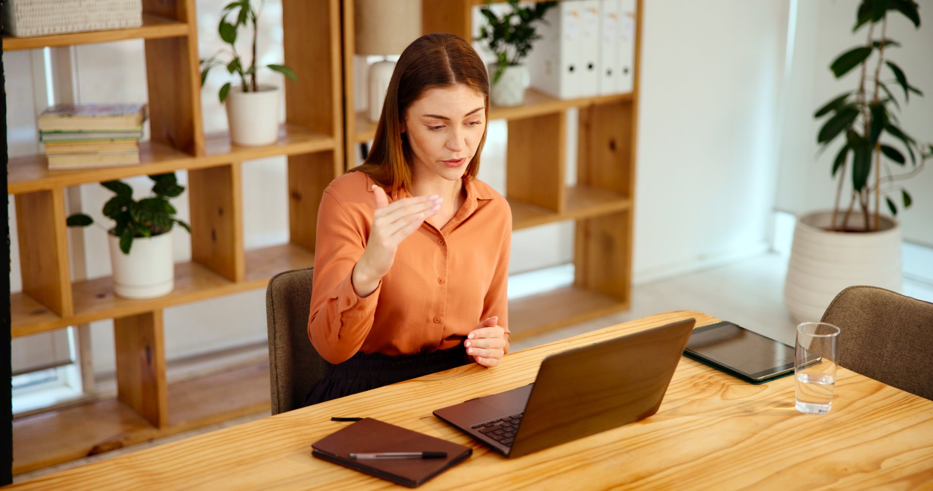 Psychologist, video call or woman on laptop talking in virtual meeting for therapy help or online client. Explain, therapist or consultant in webinar for advice, psychology coaching or care in office