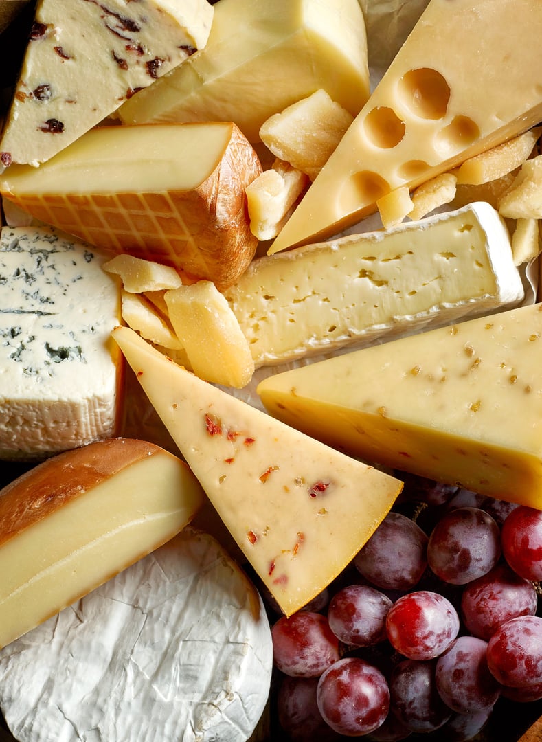 various types of cheese background