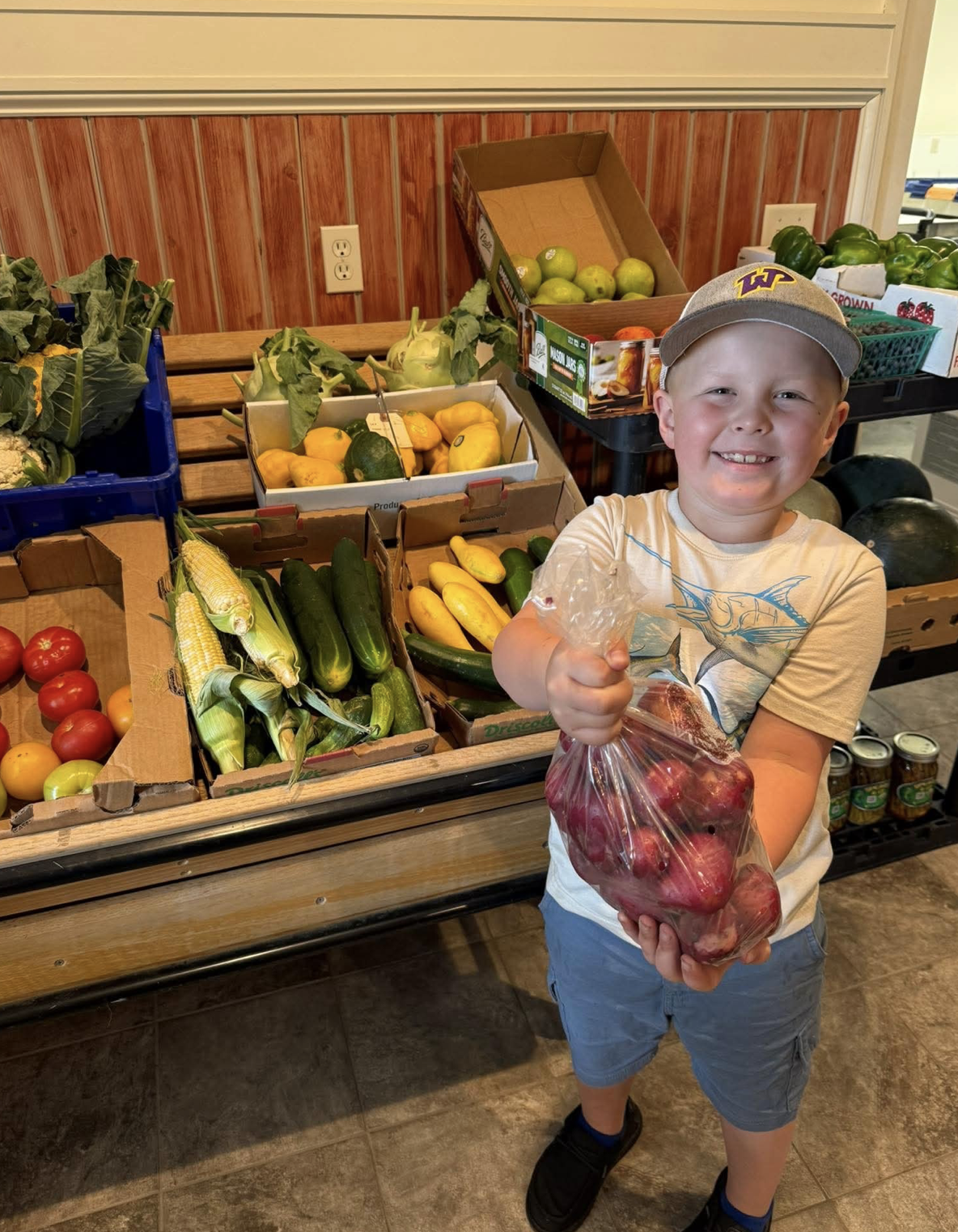 Tate working on the farm, hands-on with farming operations