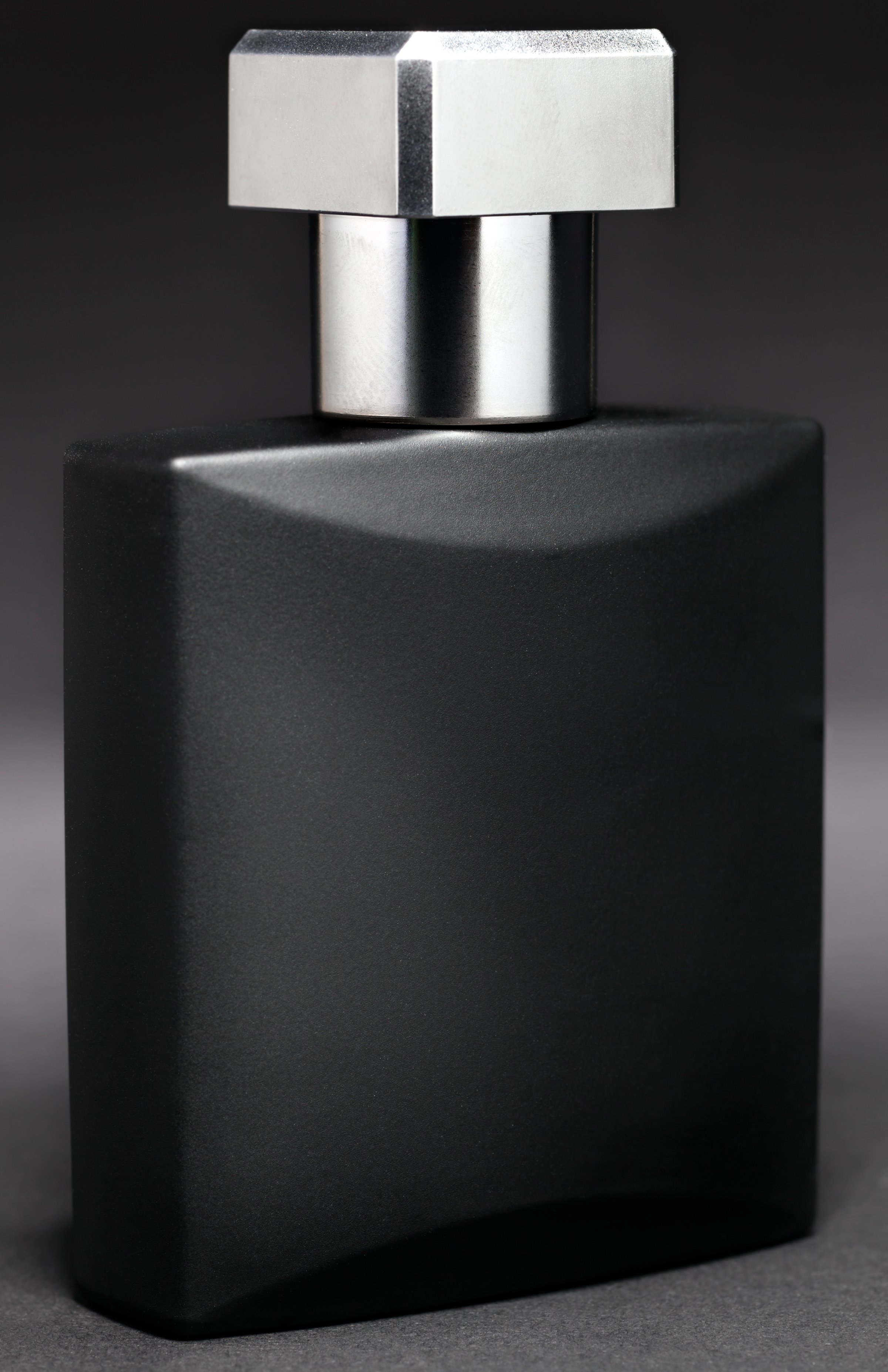 High contrast shot of an aftershave fragrance.