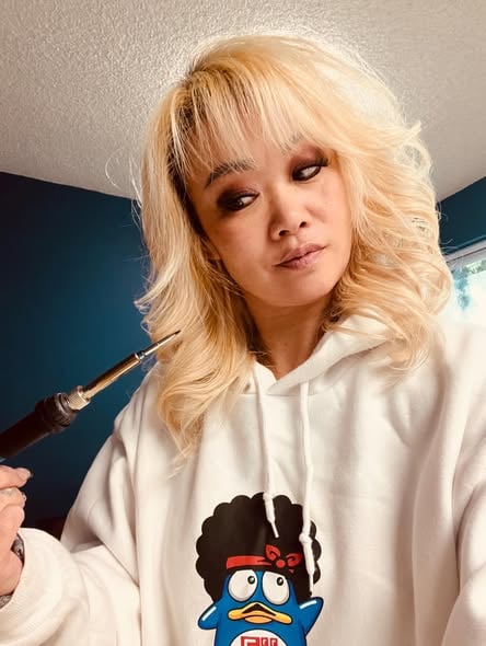 Melissa Louie tattooing a client at Inkspirations Tattoo