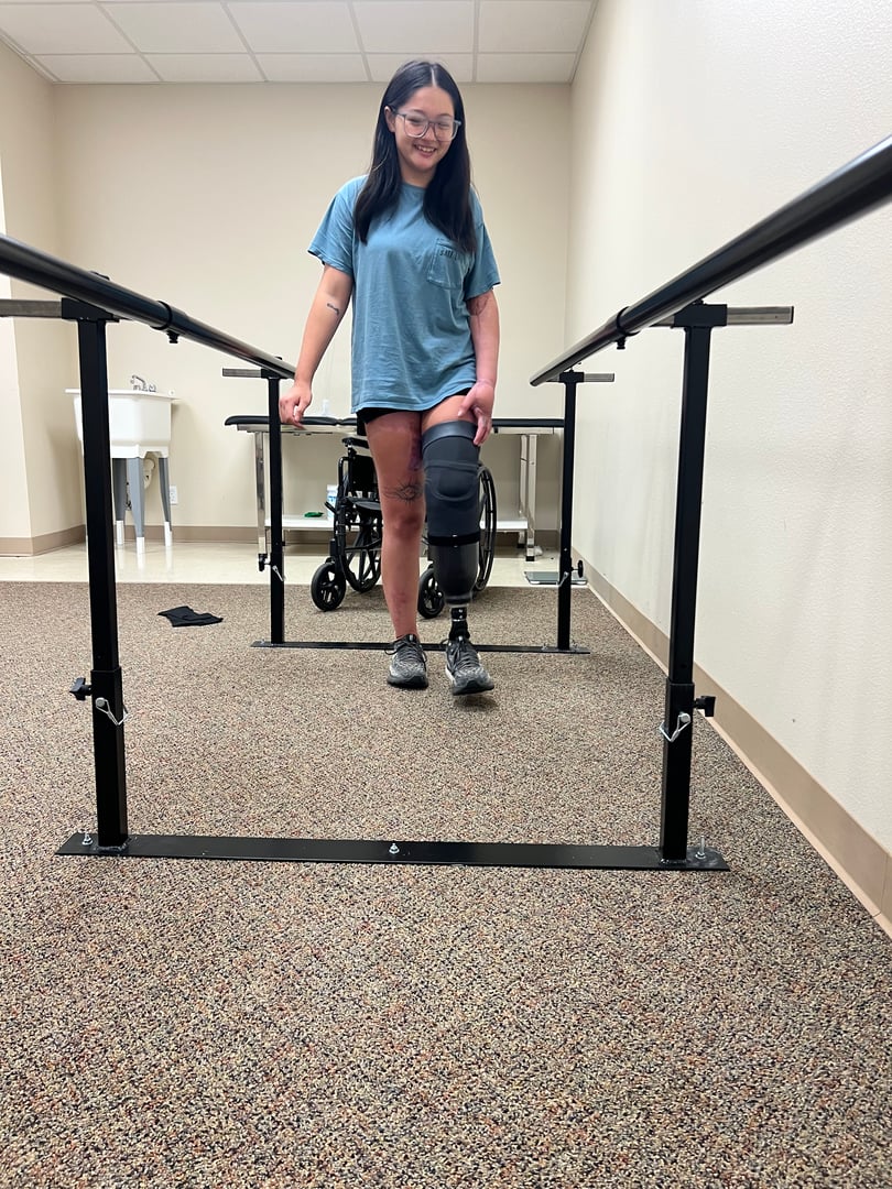 Angelie successfully using her prosthetic, demonstrating mobility and confidence