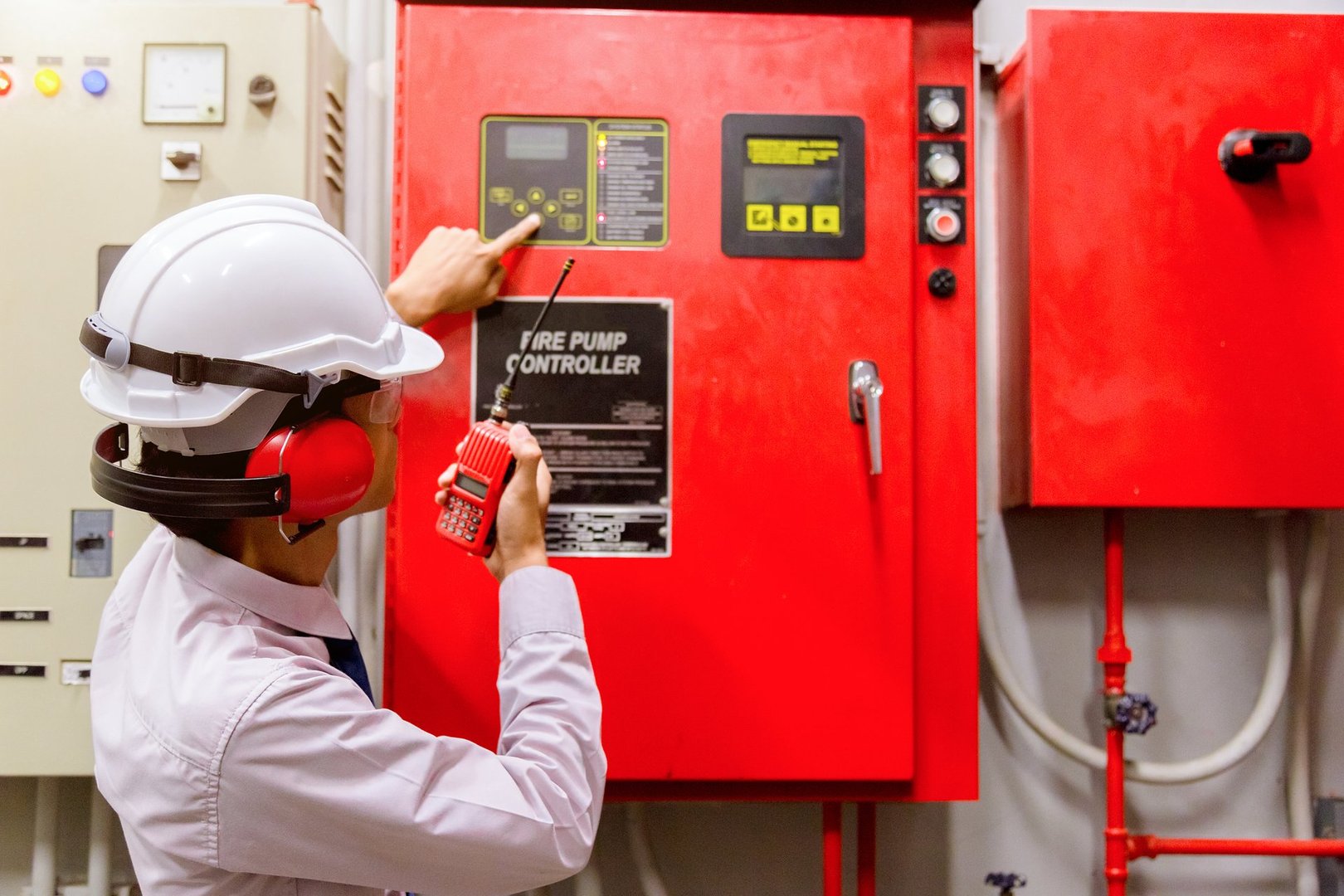 Engineer checking Industrial fire control system,Fire Alarm controller, Fire notifier, Anti fire.System ready In the event of a fire.