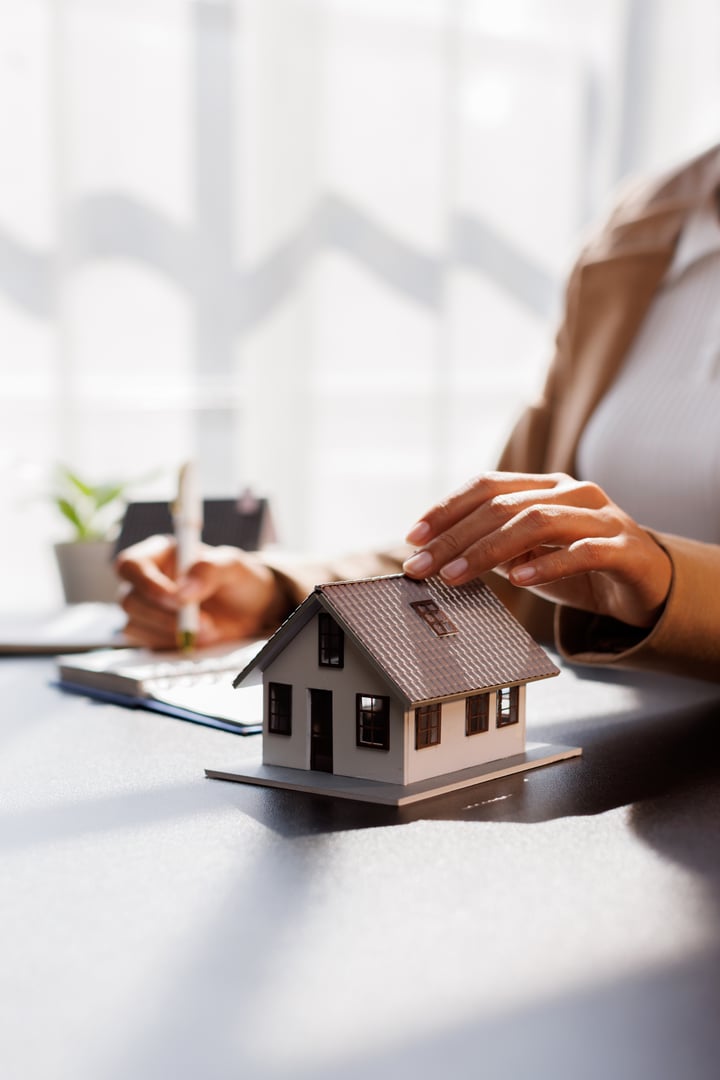 Real Estate Broker agent's signature on the contract finalized the mortgage agreement, marking a significant investment in the housing property for business purposes. Homework