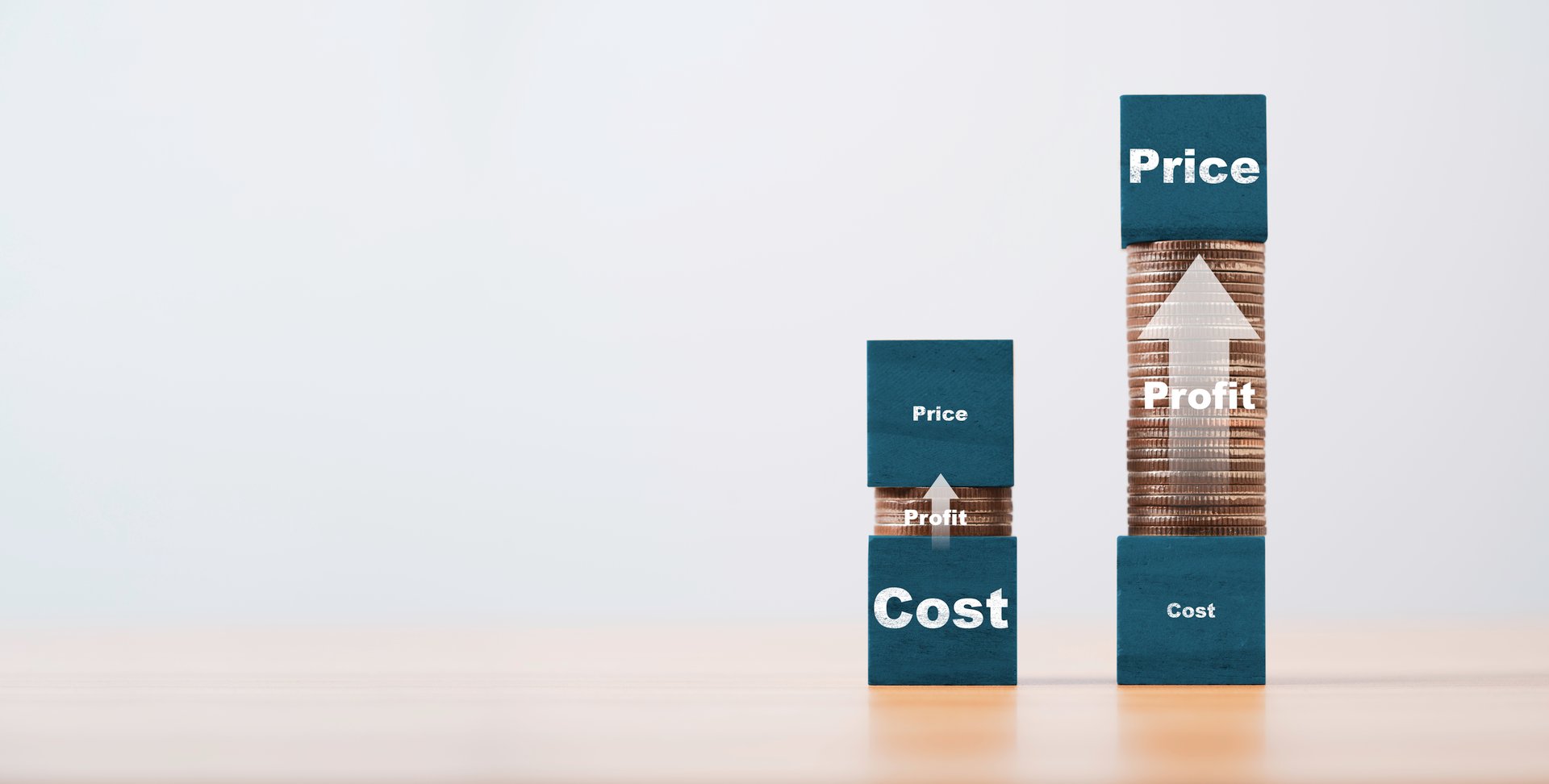 Price and cost print screen on blue wooden block cube with high and low coins stacking for business investment profit concept.