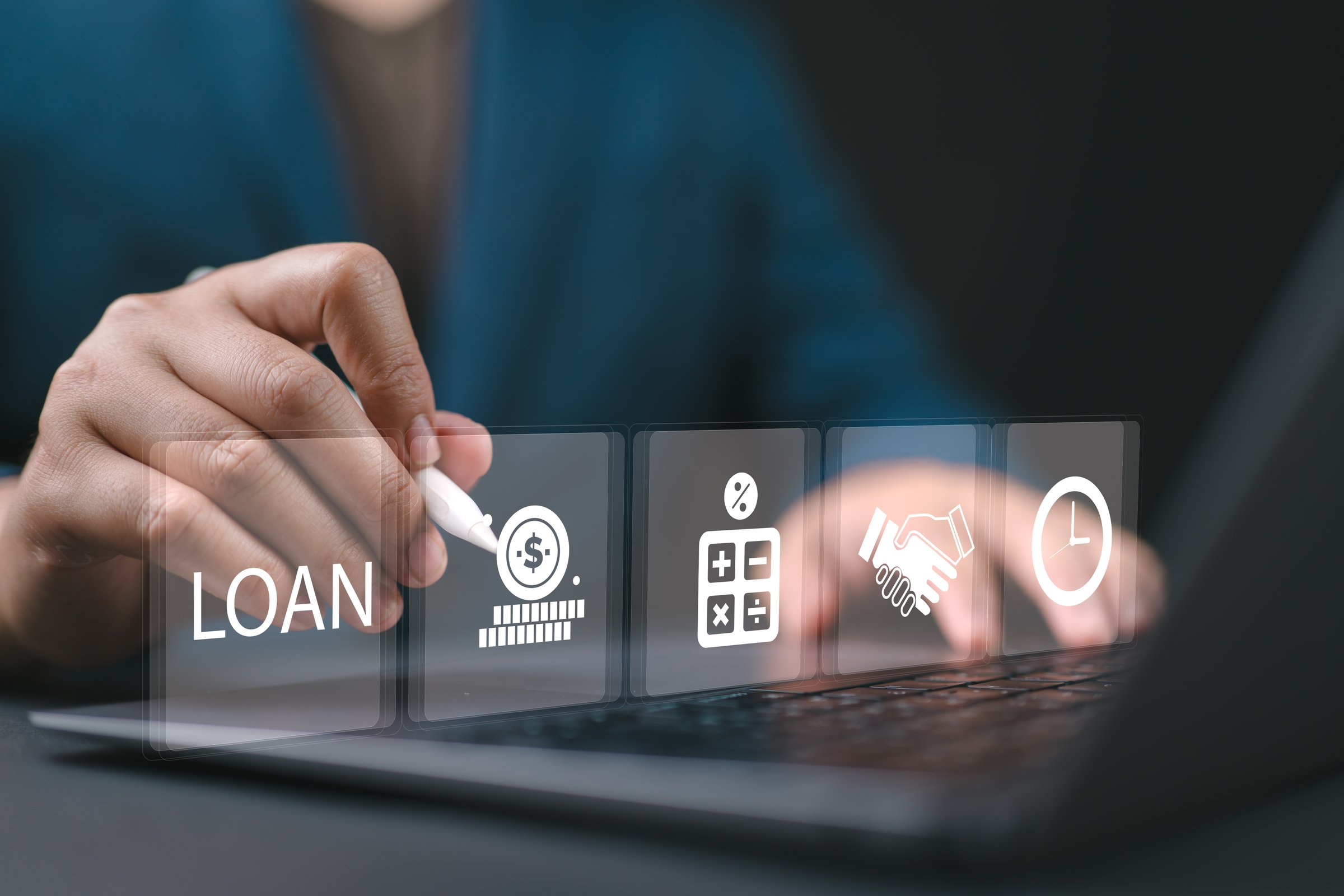 Online personal loan and financial concept. Financial loan agreement, Personal or business loans through online services between lenders and borrowers. Person using laptop laptop with loan icon.