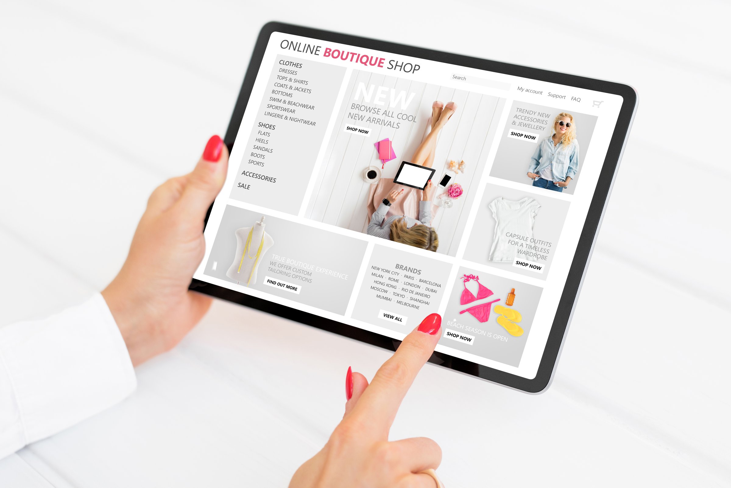 Woman browsing and shopping online by using tablet