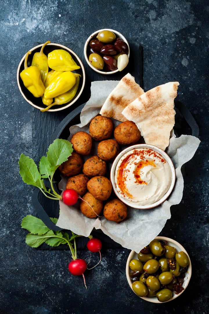 Middle Eastern traditional dinner. Authentic arab cuisine. Meze party food. Top view, flat lay, overhead