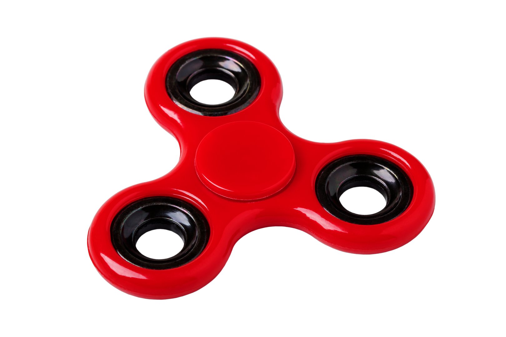 Red plastic spinner closeup isolated on white