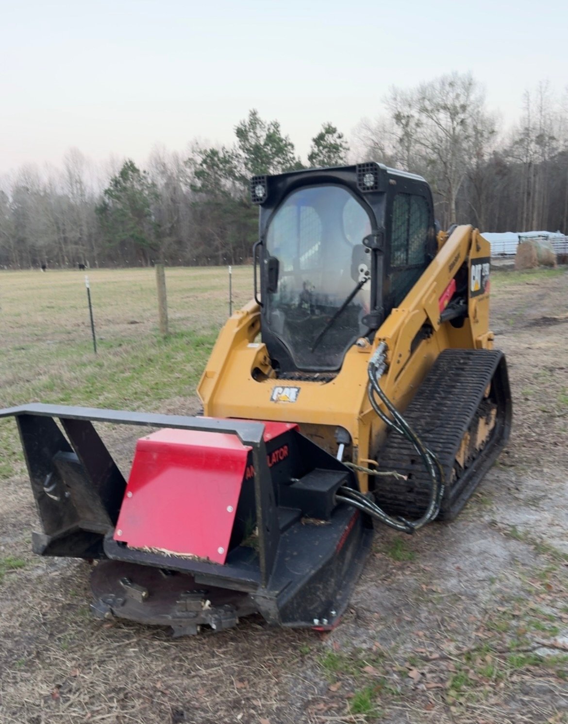 Professional land clearing equipment working on site