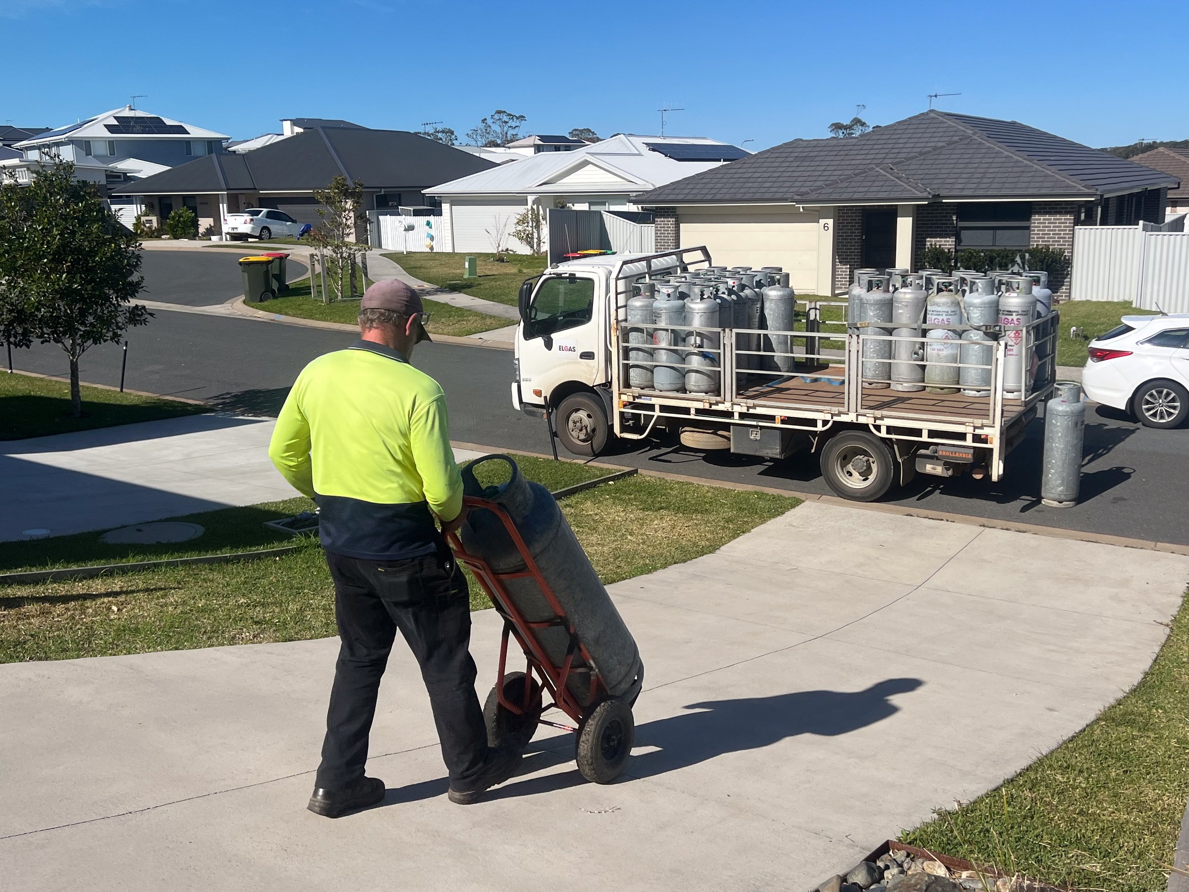 Port Macquarie, Nsw - July 10 2025:Australian gas cylinder delivery man.Australia has an abundance of gas. In fact, Australia is one of the biggest exporters of gas in the world, alongside Qatar.