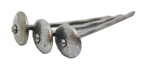 Three vintage metal spearheads with flat, circular ends arranged in a row, showing weathered texture and patina.