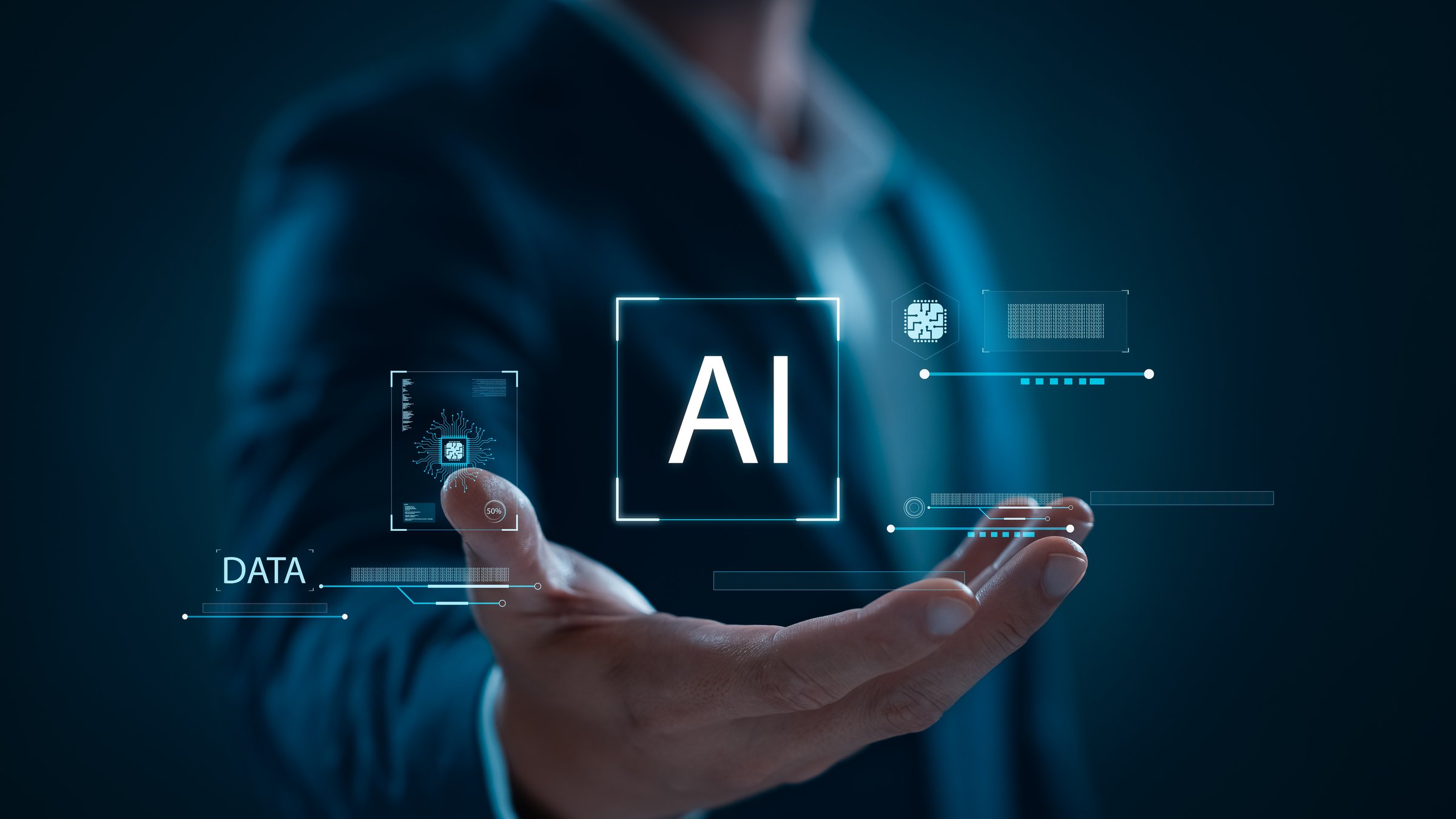 Businessman using artificial intelligence (AI) technology in future business, using artificial intelligence to make business more efficient, IoT, innovation and the future.